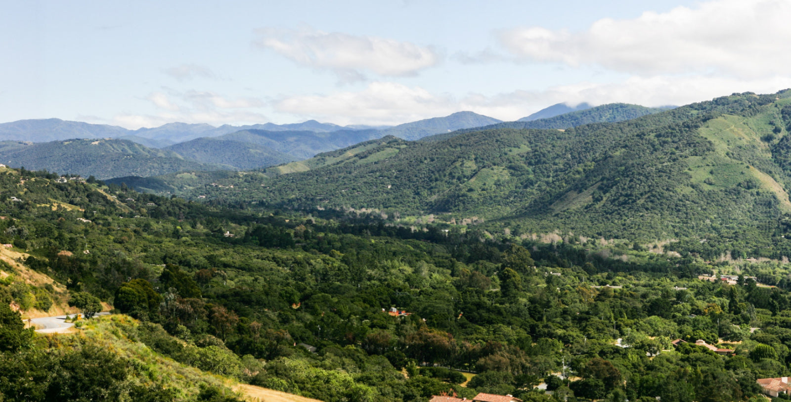 Sweeping panoramic views of green Santa Lucia mountain range and Carmel Valley
