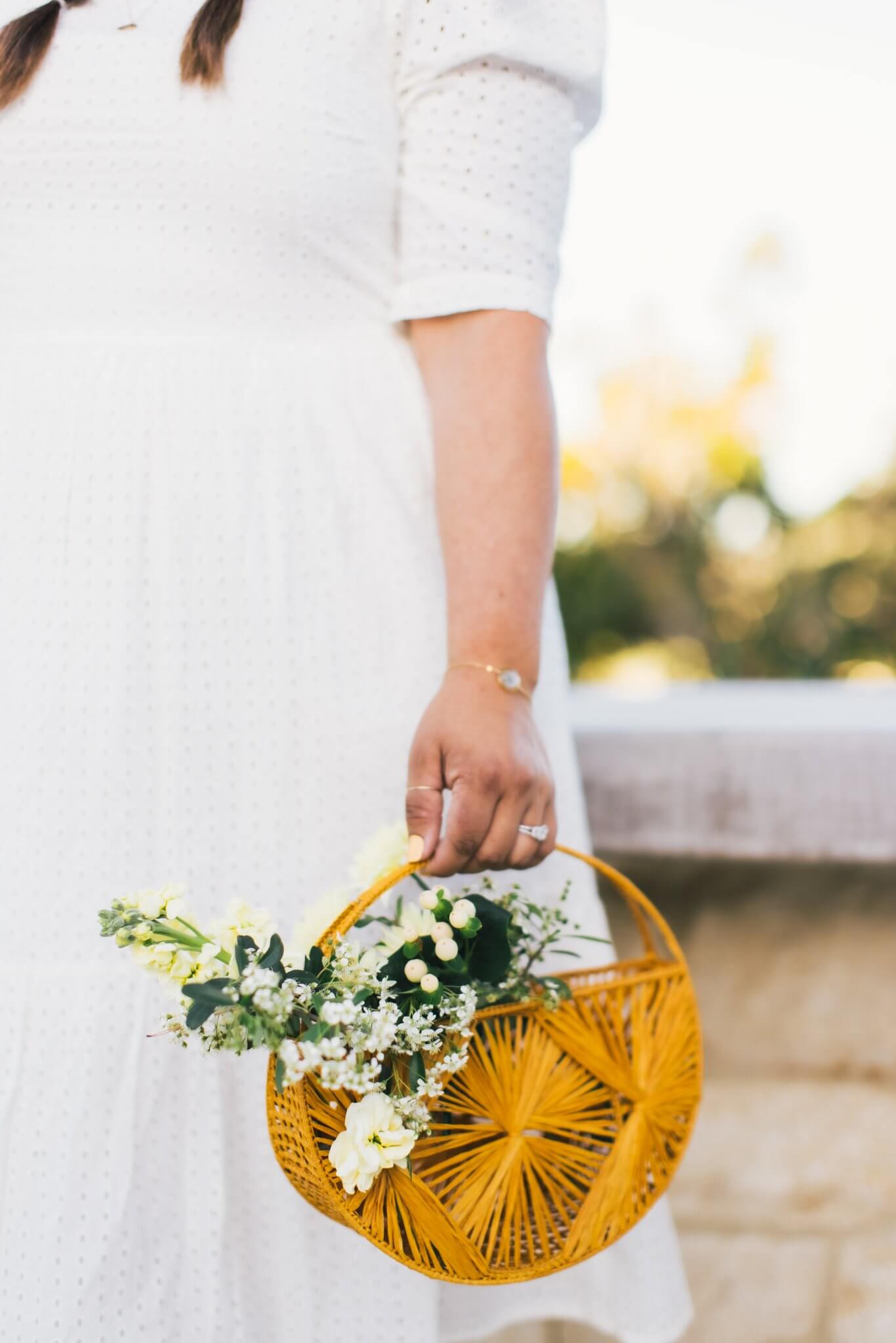 Bridesmaid holding purse bouquet at Carmel Valley Ranch wedding