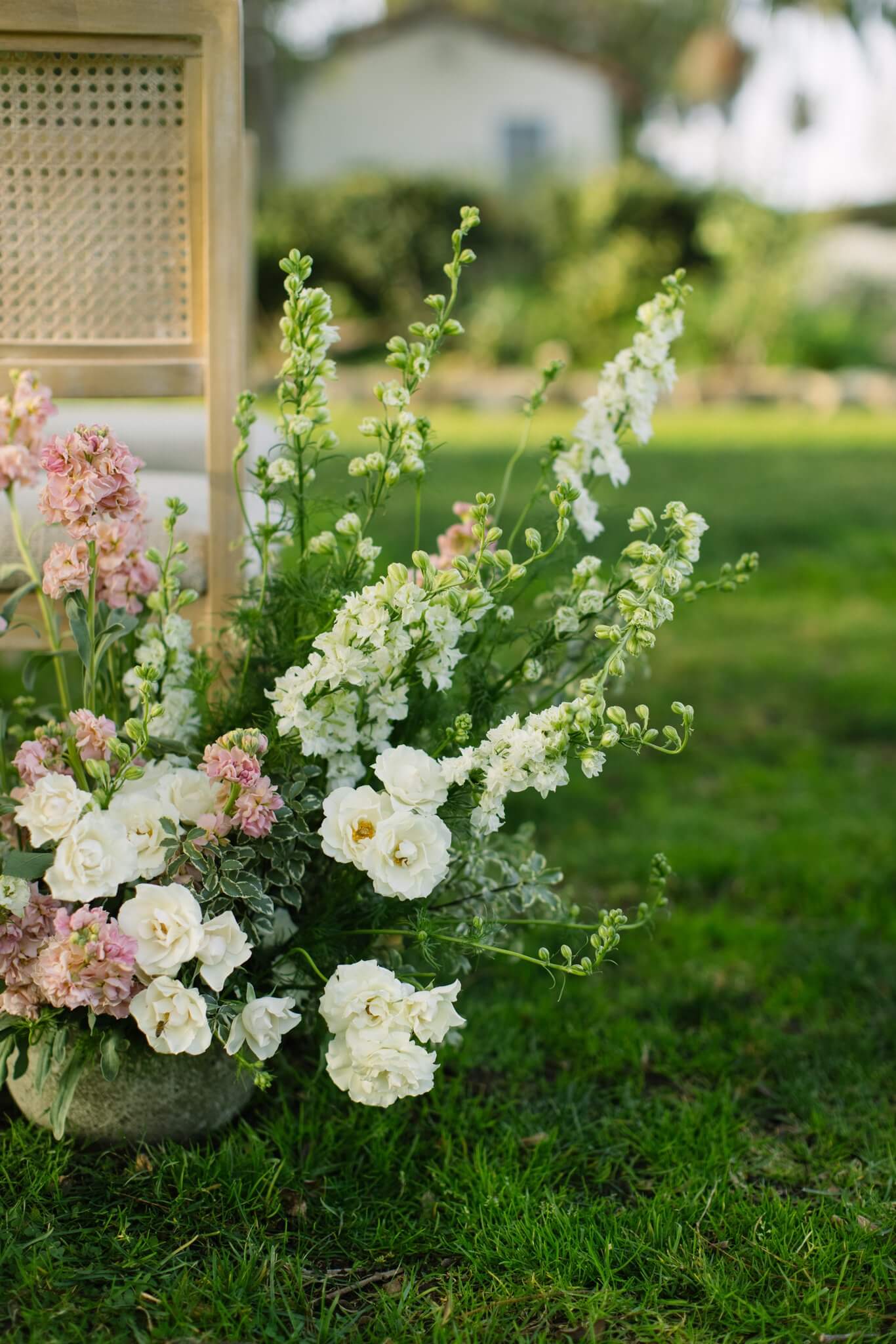 Aisle flower arrangements at Gardener Ranch wedding