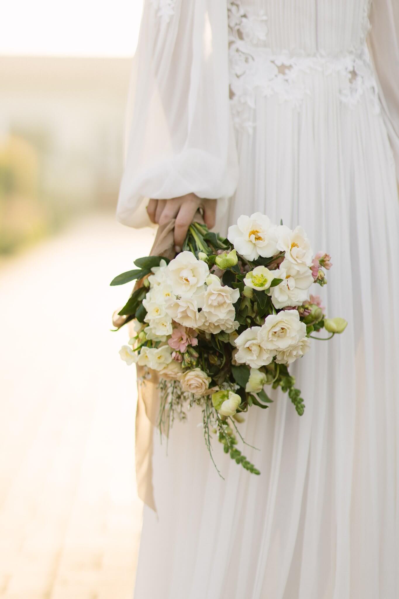 Bride holding a bouquet at a Holman Ranch wedding