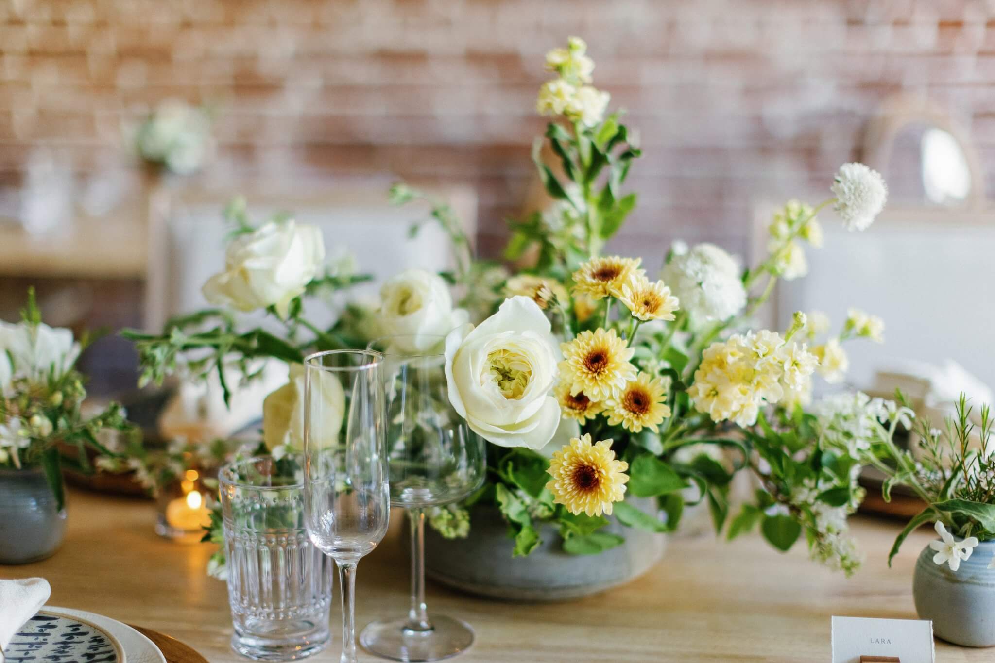 Floral centerpiece created by Monterey wedding florist