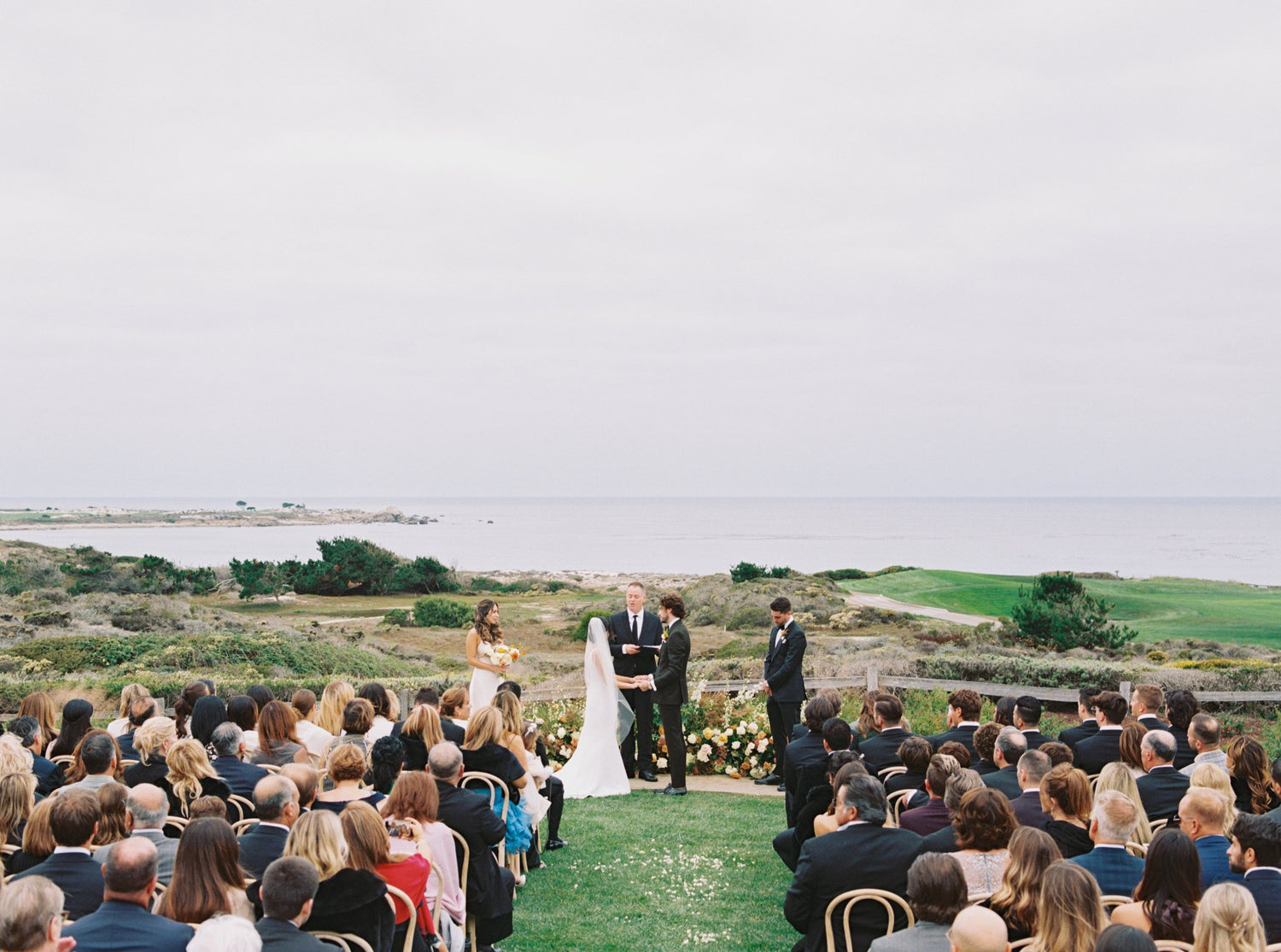 Outdoor wedding at MPCC in Pebble Beach with panoramic views of the Carmel coastline