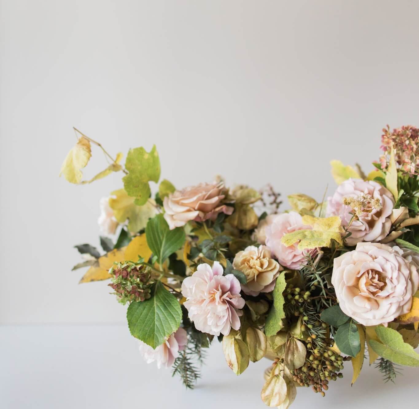 Flower centerpiece created by Pebble Beach wedding florist